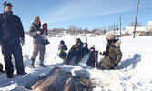 Families enjoyed roasting hot dogs and marshmallows over the bonfire.  - Tim Brody / Bulletin Photo