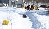 Sledding proved popular with event participants. - Tim Brody / Bulletin Photo