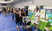 Visitors to Family Safety Night visit the booths of community agencies, organizations, and first responders.     Tim Brody / Bulletin Photo