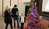 Visitors to the Festival of Trees take in the displays.   Tim Brody / Bulletin Photo