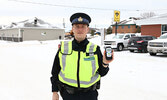 Sioux Lookout OPP constable Dylan Husak displays an Approved Screening Device (ASD).     Tim Brody / Bulletin Photo