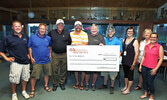 Established by the late Harvey Friesen, former President of Bearskin Airlines, members of Friesen’s family as well as tournament organizers present a cheque to the SLMHC Foundation following the 2018 Bearskin Airlines Charity Golf Classic. - Bulletin File