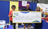 SLMHC Foundation 50/50 charity draw winner Allan Lago (centre) is congratulated by SLMHC Foundation Board President Christine Hoey (right) and SLMHC Foundation Treasurer Rita Demetzer (left), as he receives his cheque.   Tim Brody / Bulletin Photo
