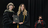 Confederation College President Kathleen Lynch (left) presents Natashia Beardy with her diploma.   Tim Brody / Bulletin Photo
