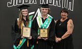 Linda Rice (right) presents Faye Mesich (left) and Kalin Roy (centre) with the Jennifer McKenzie Award of Merit.   Tim Brody / Bulletin Photo