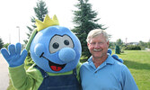 The late Harvey Friesen with Sioux Lookout Blueberry Festival mascot, Blueberry Bert.   Bulletin File Photo