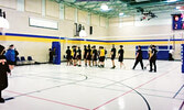 Members of the SNHS Senior Boys Volleyball team shake hands with their opponents following their match.     Dryden High School YouTube channel screen shot