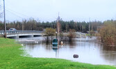 The walking path and foot bridge at the Travel Information Centre has been blocked to pedestrian traffic due to water across the Umfreville Trail.   Mike Lawrence/Bulletin Photo