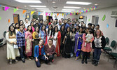 Participants celebrate Holi Milan on March 4 at the Forest Inn and Conference Centre.    Tim Brody / Bulletin Photo