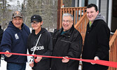 From left: Muskrat Dam Chief Vernon Morris, IFNA Student Residence Ambassador Leroy Kakegamic, Kitchenuhmaykoosib Inninuwug Chief Donny Morris, and IFNA CEO Matthew Hoppe during the official ribbon cutting ceremony. - Jesse Bonello / Bulletin Photo