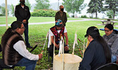 Joe Wesley (left) led traditional drumming during the ceremony, where Lac Seul First Nation Chief Derek Maud (back left) and Sioux Lookout Mayor Doug Lawrance (back right) acknowledged June as Indigenous Peoples Month in the community. - Jesse Bonello / B