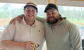 Austen Hoey (left) and Matt Monkman, winners of the Ironheart Golf Tournament’s First Flight.   Photo courtesy of SLGCC