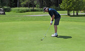 Along with competing in the tournament, participants also had the chance to win additional prizes by competing in a putting contest. - Jesse Bonello / Bulletin Photos