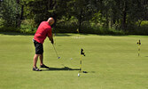 Along with competing in the tournament, participants also had the chance to win additional prizes by competing in a putting contest. - Jesse Bonello / Bulletin Photos