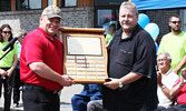 Rotary Club of Sioux Lookout Past President Klaus Knorz (left) presents Bruce George with the 2018 Jack McKenzie Memorial Award. - Bulletin File Photo