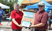 Rotary Club of Sioux Lookout representative Susan Barclay presents Ron Lemmon with the 2019 Jack McKenzie Memorial Award. - Tim Brody / Bulletin Photo
