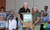 Andreas Kottschoth, President of the Rotary Club of Sioux Lookout (left), presents Anne Saltel with the Jack McKenzie Memorial Award for outstanding volunteerism. Saltel said she was humbled to receive the recognition.     Tim Brody / Bulletin Photo