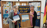 Darlene Angeconeb (right) receives the 2021 Jack McKenzie Memorial Award from Rotarian Susan Barclay.   Photo courtesy of the Rotary Club of Sioux Lookout