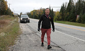 Howard Meshake makes his way out of Sioux Lookout accompanied by a support vehicle carrying his wife, Jeannie Carpenter.   Tim Brody / Bulletin Photo