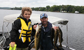 Brody Courchene (left) and Derrick Sawdo display their catch.    Tim Brody / Bulletin Photo