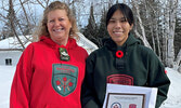 MCpl Lori Kendall presents a cheque and plaque to Summer Southwind, who earned the Canada Company Bursary Award.    Lori Kendall / Submitted Photo