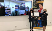 Amanda Stefanile, Achievement Program Coordinator (second from right), and Dr. Moira McPherson, President and Vice-Chancellor (far right), celebrated the signing of a memorandum of understanding (MOU) between Lakehead University and the Keewatin-Patricia 