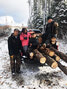 Jon Quequish, Mercy Quezuish-Quezance, Bishop Quequish, and Cruiz Binguis-Johnston with a pile of firewood stacked up in the truck. - Waninitawingaang Memorial School / Submitted Photos