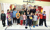 Axis Theatre actresses Jen Cassady (left), Christine Reinfort (centre), Sarah May Remond (right), and Mr. Hatch (puppet) pose for a photo with Kids Kaleidoscope Entertainment Series showgoers. - Tim Brody / Bulletin Photo