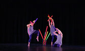 From left: Dancers Melissa Roy, Myrielle Bernier-Acuna, and Meghan Mainville use “Boomwhackers” to act out a scene from outer space.   Tim Brody / Bulletin Photo