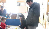 Parents and their children attended Kindergarten Open Houses at SHS (left) and SMPS (right) last week. - Tim Brody / Bulletin Photo