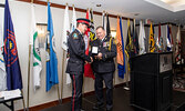 Constable Robert Lawrance (left) accepts the Medal of Bravery award at the First Nations Chiefs of Police Association Banquet on Oct 27. FNCPA President - Chief Jerel Swamp (right) presented the award.     Photo courtesy Lac Seul Police Service