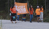 The Every Child Matters banner served as a fitting reminder of why the community had gathered together on this day.      Mike Lawrence / Bulletin Photo