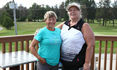 Tournament Organizer Tanya Tekavcic (left) and Ladies Blueberry Open champ Betty Ann Roy. - Tim Brody / Bulletin Photos