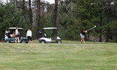 Linda Rice tees off during the Ladies Blueberry Open. - Tim Brody / Bulletin Photos