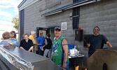 Leslie West (left) and Tony Anderson prepare Legion guests’ steaks. - Submitted Photos