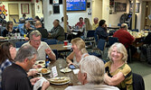 Diners at the Legion’s first steak fry of the year.   Tim Brody / Bulletin Photo