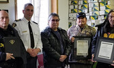 From left: P/C Jean Duguay, S/Sgt Karl Duewel, Chief Brennan Sainnawap, Dwayne Brown, and Band Councillor Clifford Beardy. - Sioux Lookout OPP / Submitted Photo