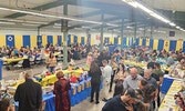 Lobsterfest attendees decide where to use their tickets for the penny auction.   Andre Gomelyuk / Bulletin Photo