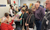 Mrs. Bastone converses with well-wishers during at her 100th birthday party.     Tim Brody / Bulletin Photo