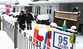 Francantonio Bastone captures a livestream of his mother Luigina Bastone’s birthday drive by. - Tim Brody / Bulletin Photo