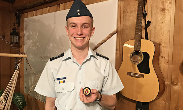 Sioux Lookout cadet Luke Bates presented with Central Region Leadership Team Challenge Coin