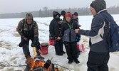 Sioux Mountain Public School students enjoyed a day out on Smock Lake, just up the Alcona Highway, where they participated in ice fishing along with Nishnawbe-Gamik Friendship Centre staff and Lac Seul Hard Water Adventures on March 14. - Sioux Mountain S