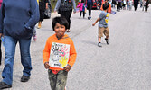 Lac Seul First Nation elementary students walked in solidarity with community leadership, members and elders to promote sober and healthy living. - Jesse Bonello / Bulletin Photo