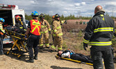 From left: Dr. Evangelie Mosconas, Dr. Alice Gwyn, Michelle Bertrand, RPN, and Dr. Julie Caron “provide care” for “crash victim” Eric Goretzki. - Tim Brody / Bulletin Photo