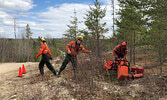 MNRF FireRangers prepare to battle a fire set up at the scene of the training exercise. - Tim Brody / Bulletin Photo