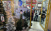 From left, Shannon Brody, Marlene MacDonald, and Jackie Duhamel visit Home Hardware during Moonlight Madness.    Tim Brody / Bulletin Photo