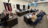 ISC representatives (left) address Sioux Lookout Municipal Council.   Tim Brody / Bulletin Photo