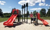 A sign at the playground at the Travel Information Centre reminds playground users to social distance. - Tim Brody/ Bulletin Photo