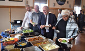 From right: Sarita Verma, Dr. Pierre Zundel, and other NOSM board members enjoyed a miichem feast at the Nishnawbe-Gamik Friendship Centre. - Jesse Bonello / Bulletin Photos