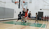 The Sioux Lookout Warriors in action against the Westgate Collegiate and Vocational Institute Tigers in Game 1 of the NWOSSA AA Senior Boys Basketball Championship held at SNHS.     Tim Brody / Bulletin Photo